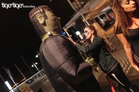 Giant inflatable monster used as a photo backdrop at a Halloween event