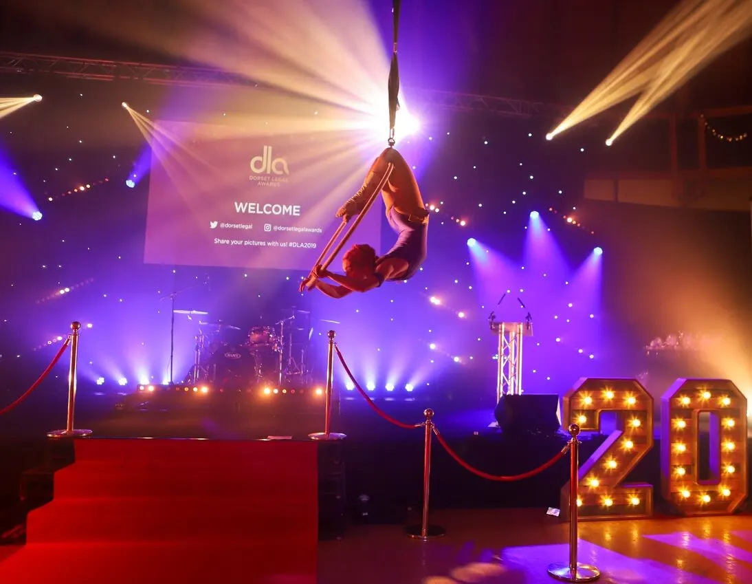 Dorset Legal Awards aerial hoop: aerial performers, circus showman theme