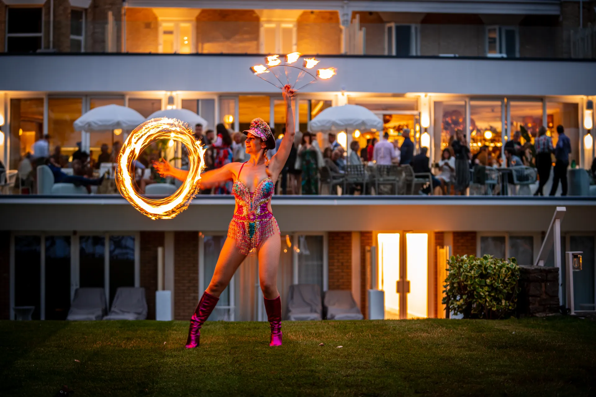 Fire fans spinning: fire performers