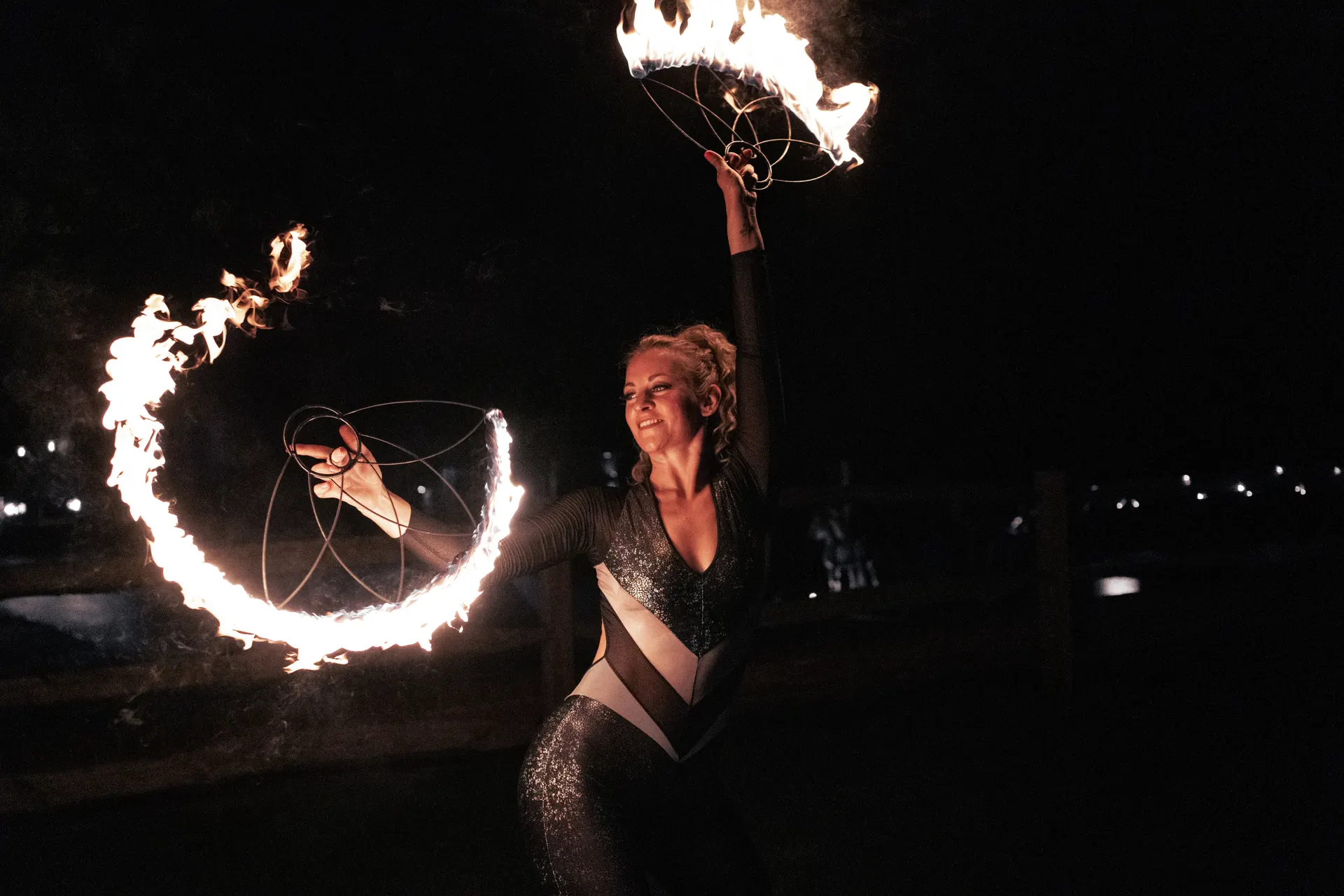 Fire fans spinning static: fire performers