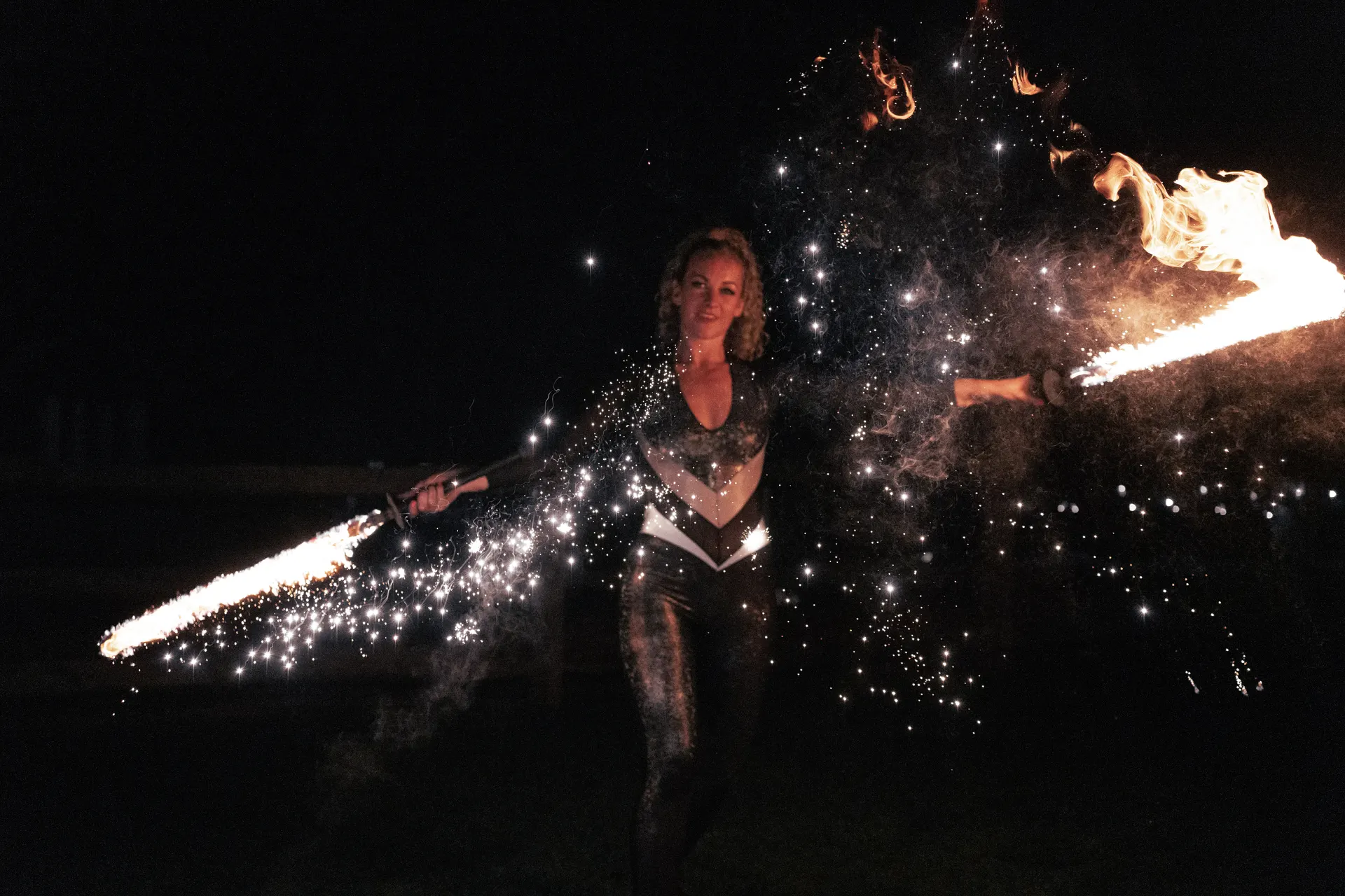 Fire swords with SFX titanium sparkle powder: fire performers