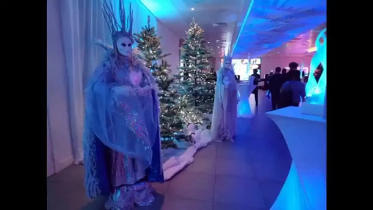 Ethereal ice frozen statues at winter wonderland themed corporate event: living statues, winter wonderland theme